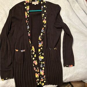 Black Sweater with colored print along button area.  Size 2